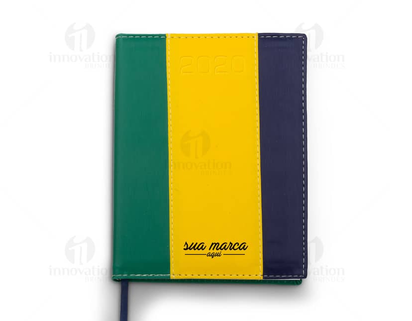 Kit com 6 porta copos em formato redondo, feitos de cortiça e estampados com diferentes padrões geométricos em tons de azul, amarelo e branco.