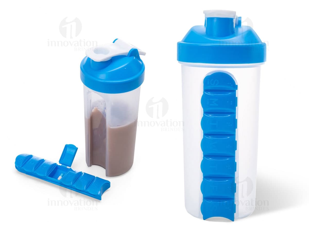 Coqueteleira com porta comprimido em cor rosa e transparente, utilizada para misturar suplementos em pó com água ou leite. Coqueteleira com porta comprimido em cor rosa e transparente, utilizada para misturar suplementos em pó com água ou leite.
