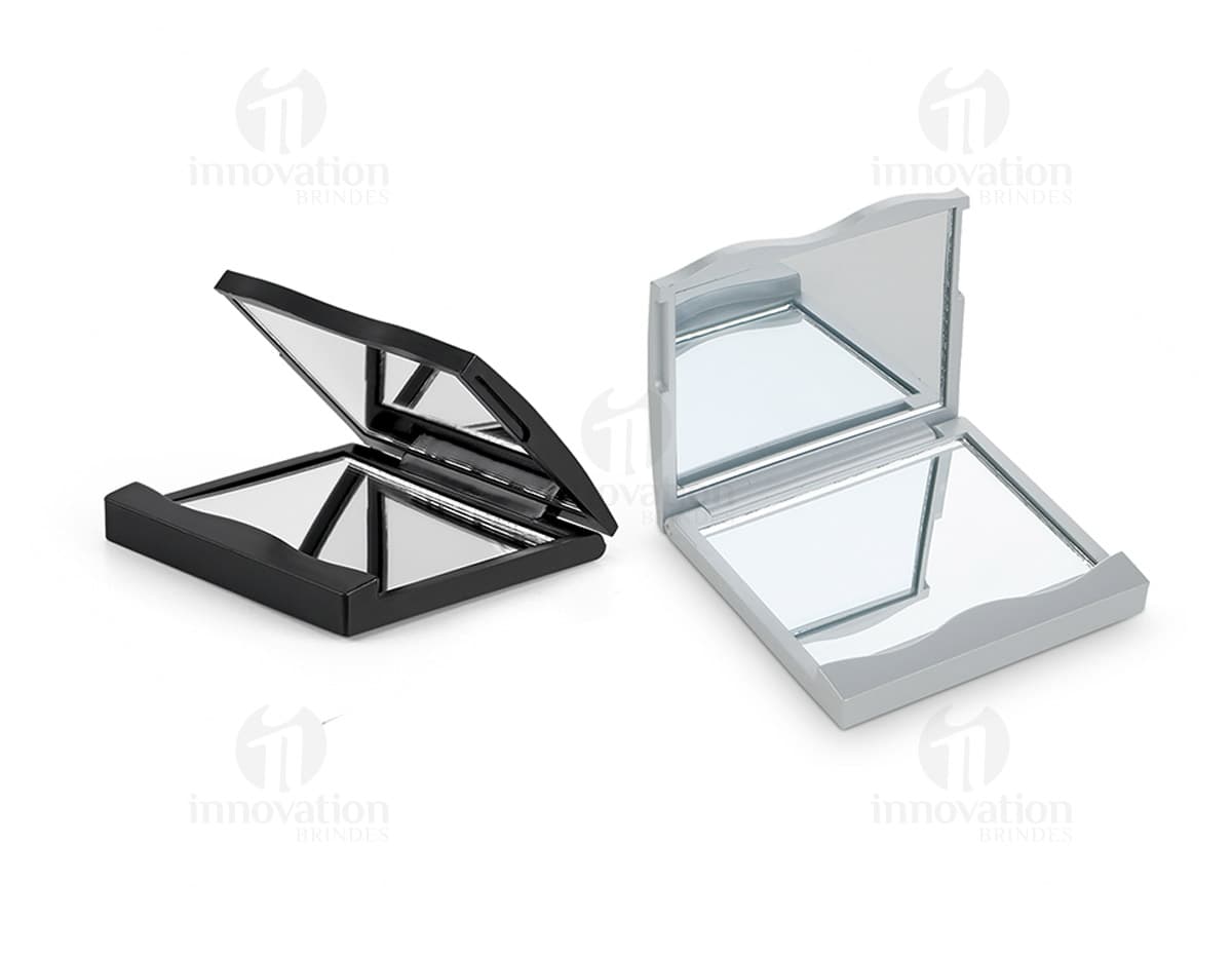 Espelho plástico duplo sem aumento com design moderno, metálico e preto. Produto de cozinha, utensílio de servir, com botão redondo e brilhante. Ideal para refeições, cozinha e escritório. Espelho plástico duplo sem aumento com design moderno, metálico e preto. Produto de cozinha, utensílio de servir, com botão redondo e brilhante. Ideal para refeições, cozinha e escritório.