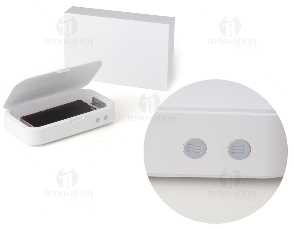 Caixa de esterilização multifuncional de cor branca, com capacidade para acomodar diversos itens e equipada com tecnologia de esterilização UV. Caixa de esterilização multifuncional de cor branca, com capacidade para acomodar diversos itens e equipada com tecnologia de esterilização UV.