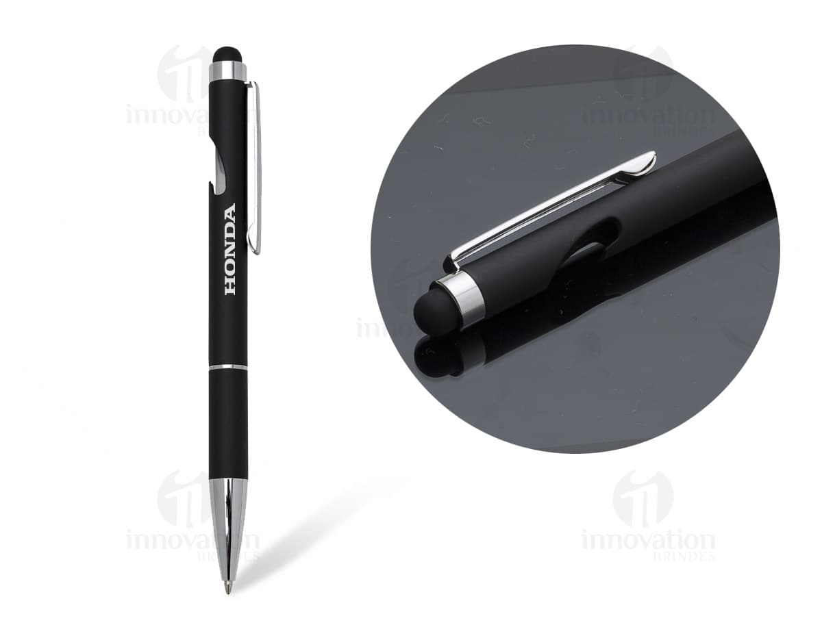 Caneta metal com abridor em fundo branco. Caneta metal com abridor em fundo branco.