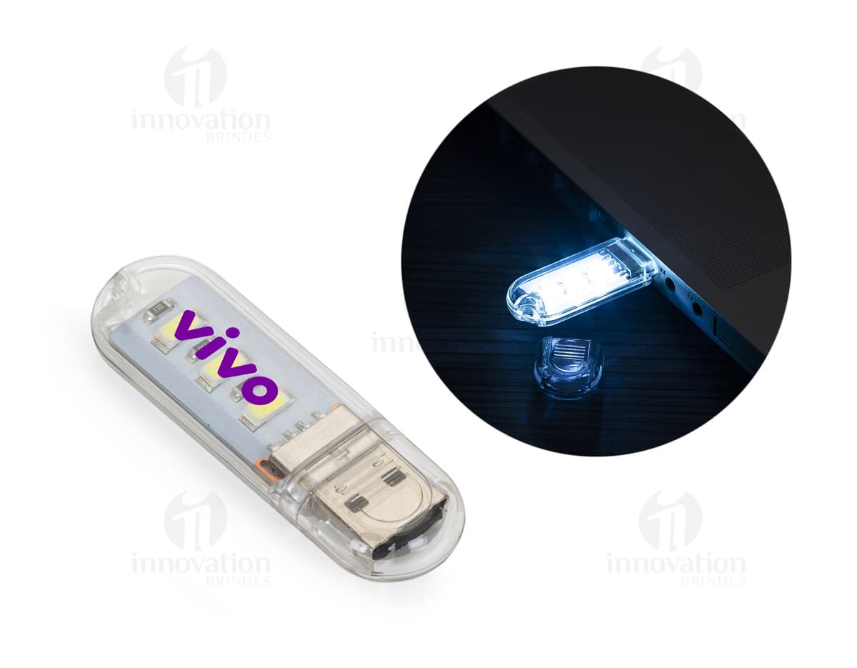 Luminária plástica com design moderno e compacto, possui iluminação de LED e conectividade USB. Luminária plástica com design moderno e compacto, possui iluminação de LED e conectividade USB.