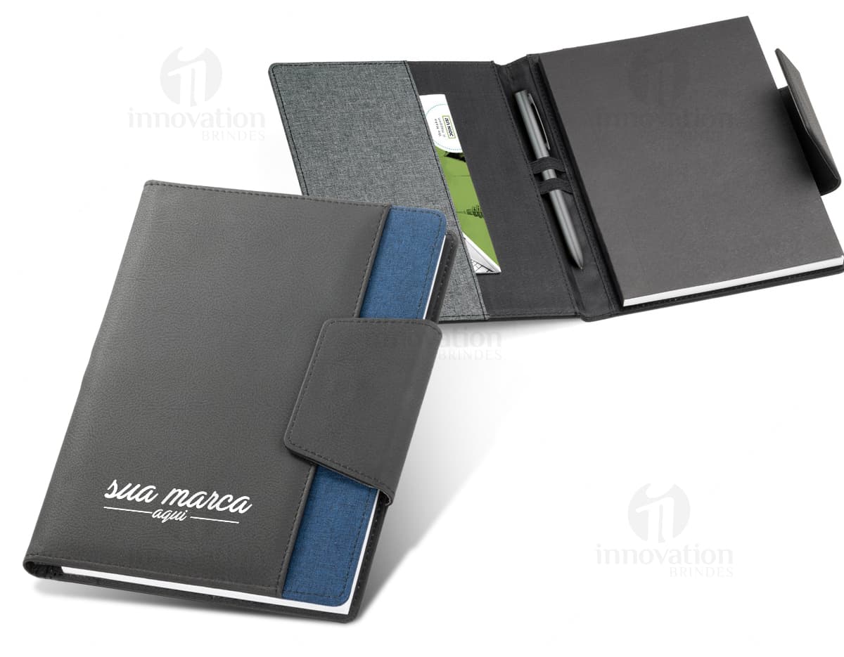 Produto: Bloco de Anotacoes 14x8 na cor preta, com capa dura e folhas pautadas. Produto: Bloco de Anotacoes 14x8 na cor preta, com capa dura e folhas pautadas.