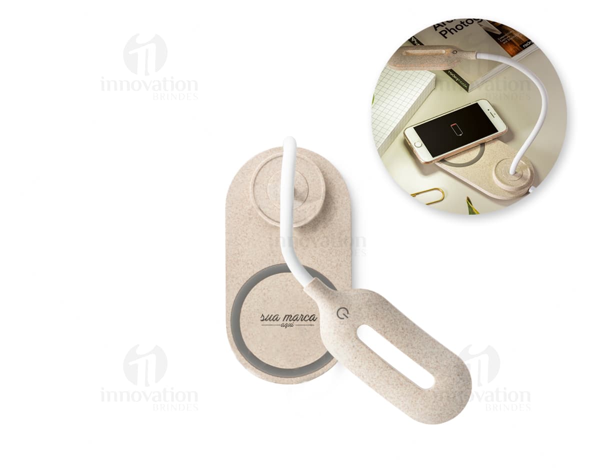 Suporte Celular Plástico na cor preta, feito de material resistente e ajustável para diferentes tamanhos de smartphones. A imagem mostra o suporte fixado em uma superfície plana. Suporte Celular Plástico na cor preta, feito de material resistente e ajustável para diferentes tamanhos de smartphones. A imagem mostra o suporte fixado em uma superfície plana.