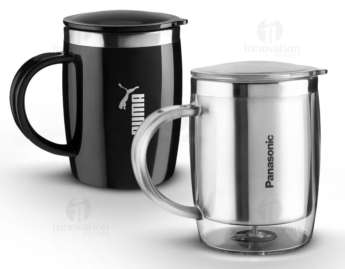 Caneca plástica com interior de inox, capacidade para 450ml, ideal para bebidas quentes como chá e café. Cor preta, com alça e design moderno. Caneca plástica com interior de inox, capacidade para 450ml, ideal para bebidas quentes como chá e café. Cor preta, com alça e design moderno.