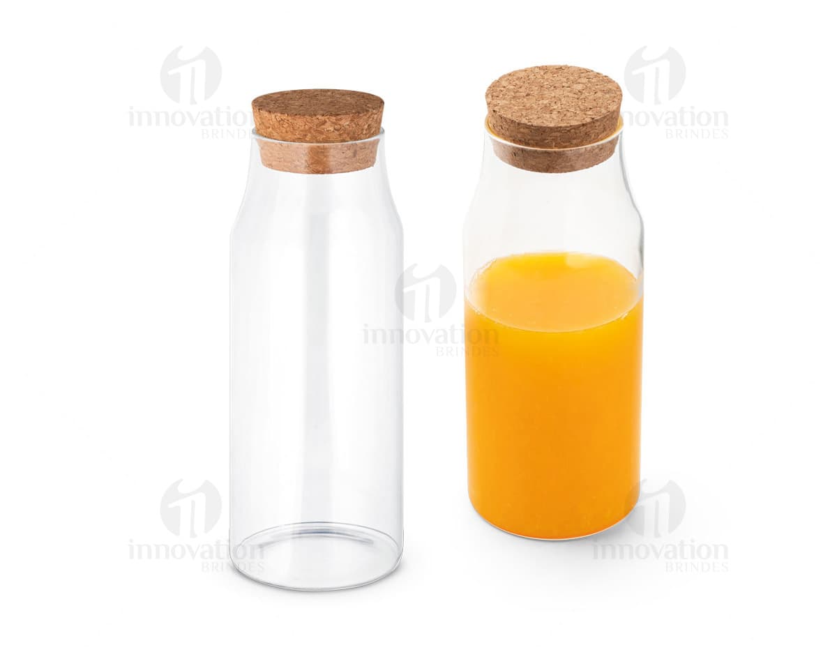 Garrafa de vidro transparente com capacidade de 1 litro, com tampa de cortiça. Garrafa de vidro transparente com capacidade de 1 litro, com tampa de cortiça.