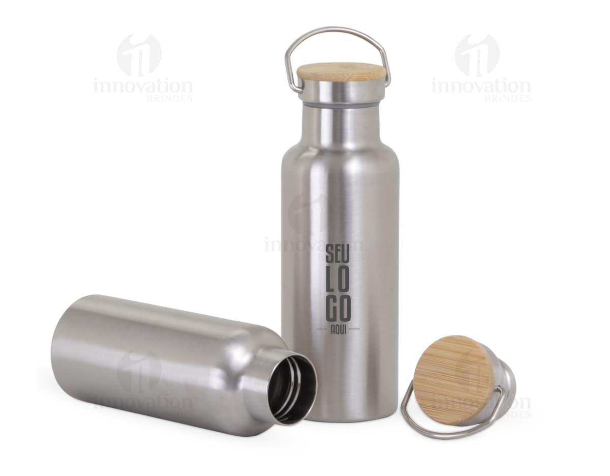 Garrafa Térmica Inox com capacidade de 400ml, possuindo botão para facilitar o despejo do líquido. Garrafa Térmica Inox com capacidade de 400ml, possuindo botão para facilitar o despejo do líquido.