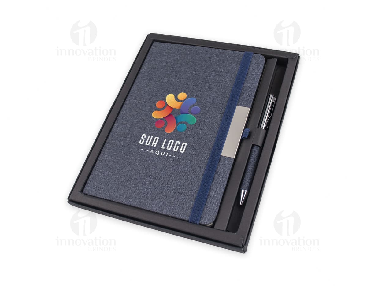 Caneta touch com suporte para celular na cor preta, utilizada em ambiente de trabalho. Caneta touch com suporte para celular na cor preta, utilizada em ambiente de trabalho.