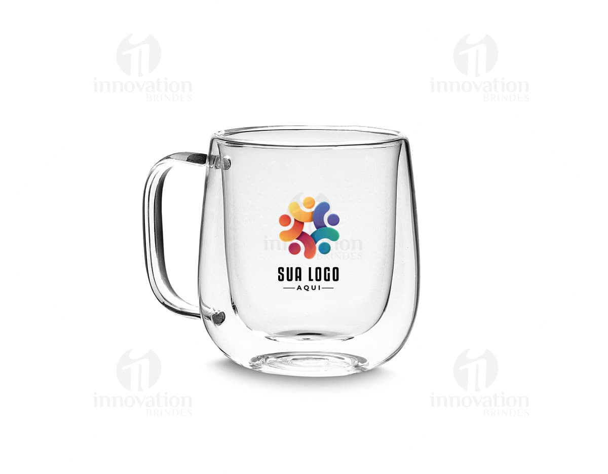 Caneca de vidro borossilicato transparente com alça e base largas, ideal para café ou chá. Caneca de vidro borossilicato transparente com alça e base largas, ideal para café ou chá.